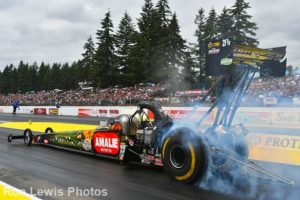 photo © Ron Lewis and CompetitionPlus McMillen burnout at the Northwest Nationals
